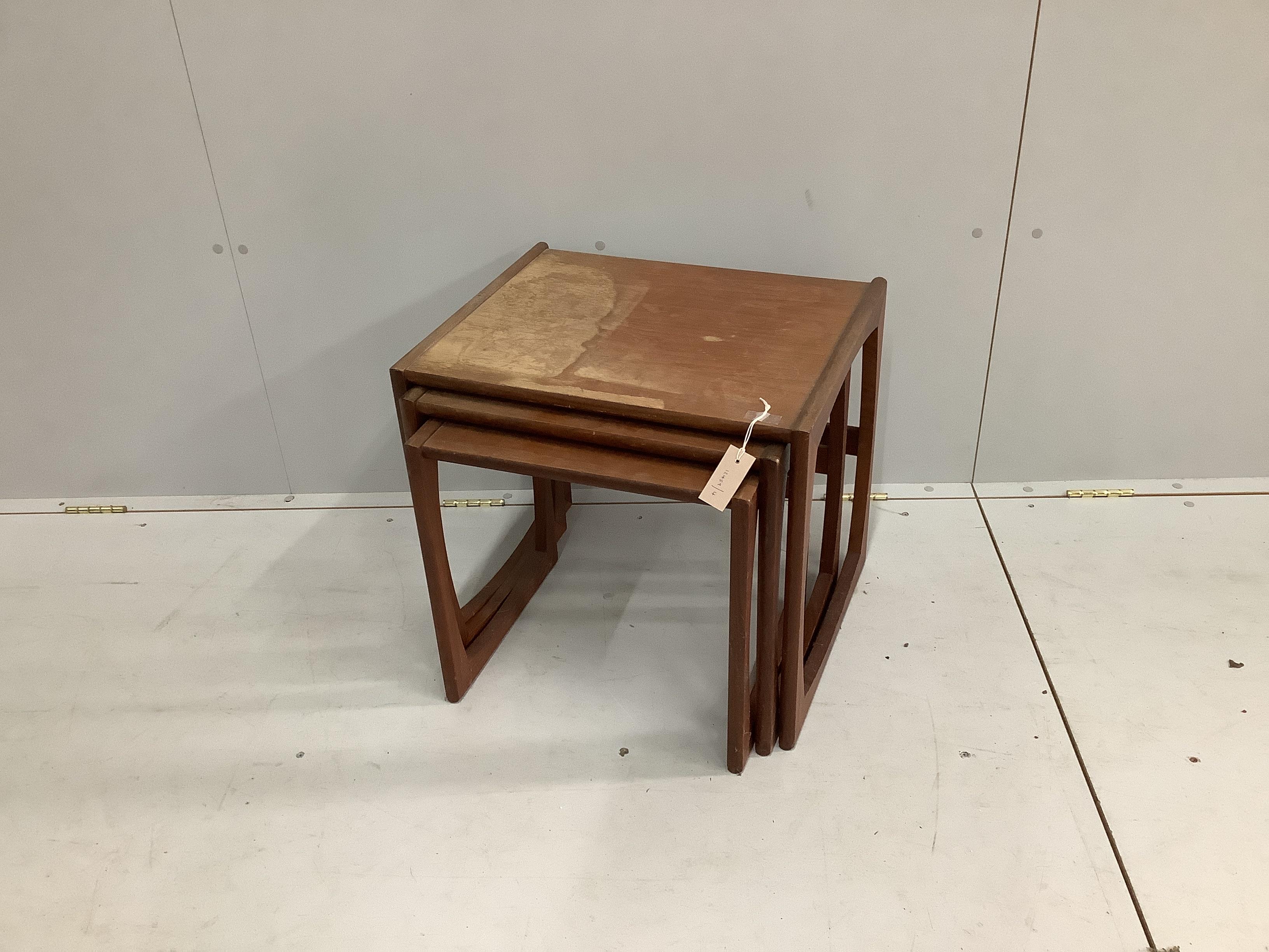 A nest of three G Plan rectangular teak tea tables, width 53cm, depth 43cm, height 48cm